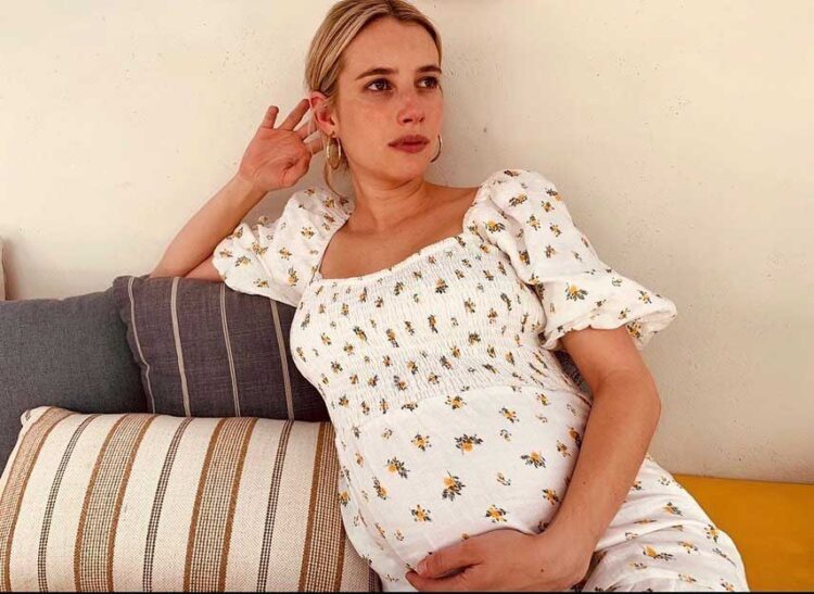 how-emma-roberts-perfectly-nails-maternity-fashion-a-style-journey-fit-for-a-queen